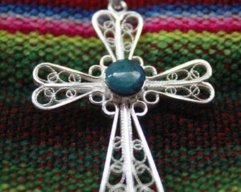 Sterling Silver Christian cross with turquoise stone