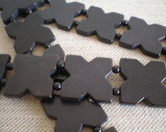 1960's Vintage black ebonised wood symbol design elasticated belt.
