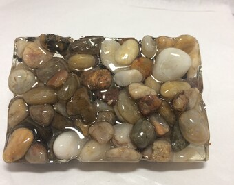 Soap dish made with rocks and shells