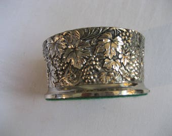 heavy antique "silver" and wood wine coaster.