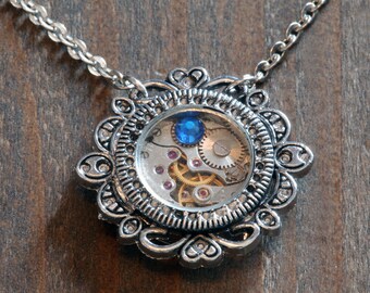 Steampunk Jewelry - Pendant - Watch movement and capri blue crystal
