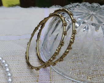 Gold Tone Metal Floral Bangles