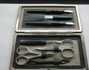 Nagelbesteck im Etuite Leder Blau,7 Teilig,Solingen,Maß ca.17,5/9 cm Deutschland ca.1965,Gebraucht Zustand gut