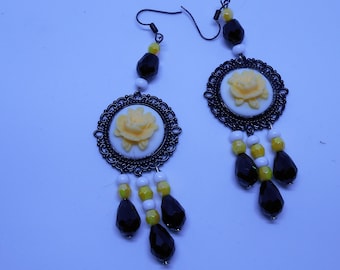 round earrings black white and pale yellow.