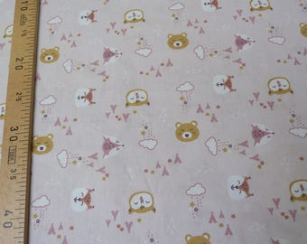 Pink printed cotton with naive patterns animals
