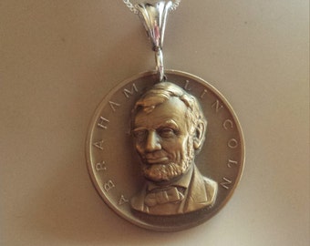 Brass Lincoln memorial coin pendant with chain