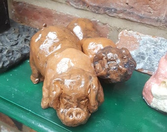 Glossy ceramic saddleback pigs