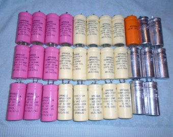 Capacitors. compulytic capacitors. steampunk. art supply. re purpose. up cycle. Vintage electronics. electronic parts.