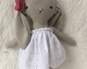 Large Bunny rabbit plush with felt flowers sewn to the ear