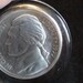 Vintage glass paperweight of Thomas Jefferson nickel