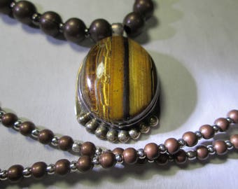 Pendant... Tiger eye in sterling silver