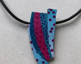Pendant of Asian Inspired Silkscreened Curved Columns on Rubber Cord