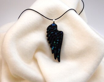 Vintage necklace with black wing pendant in resin