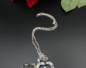 Silver necklace with heart-toothbrush. Necklace heard.