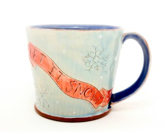 Snow/winter themed Earthenware mug. Wheel thrown, food safe mug by Kaitlyn Brennan/Brennan pottery. Perfect for coffee/tea/hot chocolate