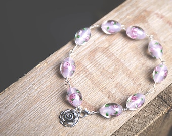 Sterling Silver bracelet with Rose Lampwork Glass Beads and Rose Charm.