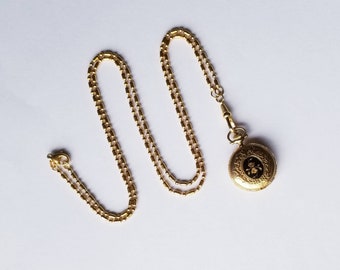 Vintage Black Enamel Bucherer Pendant Watch with Gold Floral Motif 6/0s