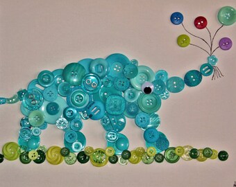 Elephant holding balloons