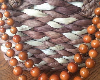 knotted graduated double amber bead necklace