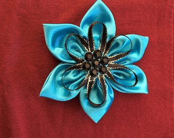 Blue satin flower alligator clip. 8cm