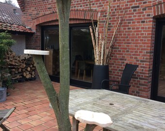 Cat made of wood with bark tree