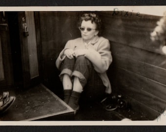 Vintage Snapshot Photo Dixie Huddled in Corner of Boat Dark Sunglasses 1940's, Original Found Photo, Vernacular Photography