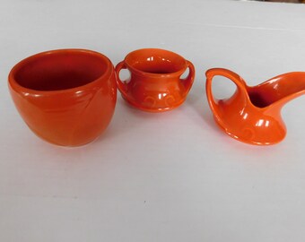 Vintage red wing art pottery orange