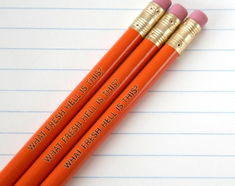 what fresh hell is this engraved pencil set 3 orange pencils. not another irritation, ugh.