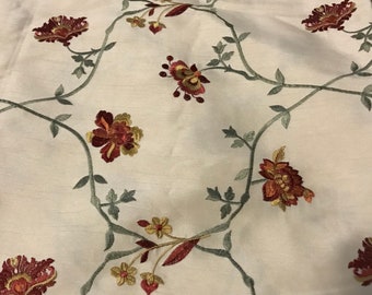 Beautiful embroidered ivory dupioni floral fabric