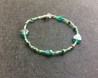 Green, blue and brown bead bracelet with leaf beads
