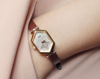 Titan Hexad | Vintage petite women unique style watch in gold hexagon bezel, silver pattern face, brown leather strap | Ladies gift ideas