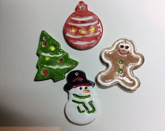 Assorted ceramic Christmas gift tags or ornaments. Five dollars for a 4 ornaments and free shipping