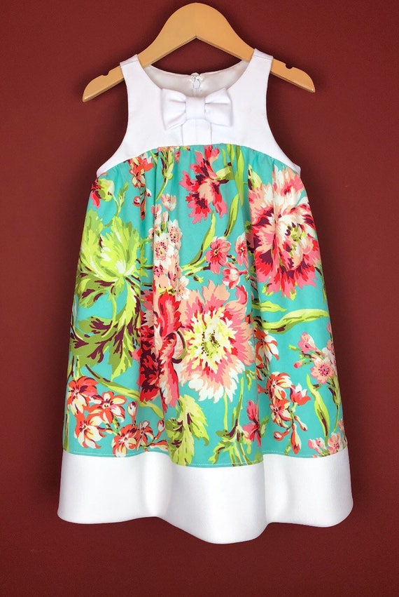 The "Bow-Tie Dress" in Aqua Floral.