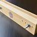 Wooden press for bookbinding, adjustable screws