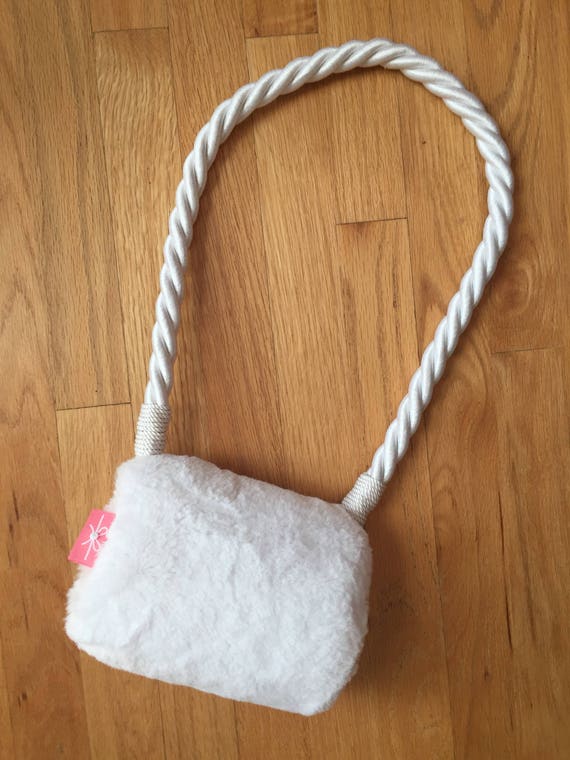The "Vegan Muff" in White Faux Fur.