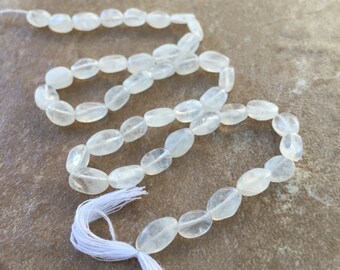 Moonstone Oval Beads, 8 to 10 mm, 13.5 inch strand.