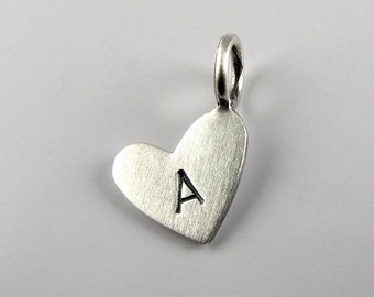 Tiny silver heart pendant with initial