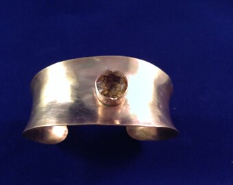 Brass cuff with golden quartz