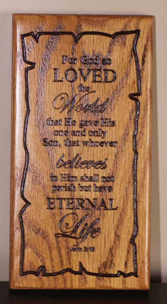 Beautiful wood carving representing the Bible verse John 3 16