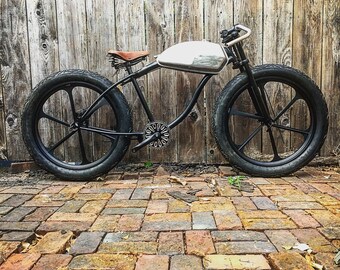 Vintage cafe racer inspired rolling chassis motorized bicycle