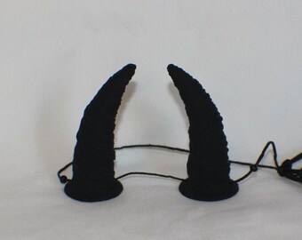 Black twisted devil horns