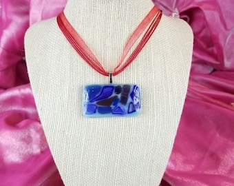 Blue Shapes On White Glass Pendant