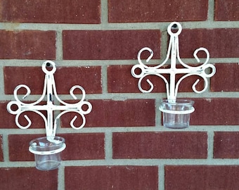 Pair of metal sconces with glass votives. FREE SHIPPING! Item # 1019163