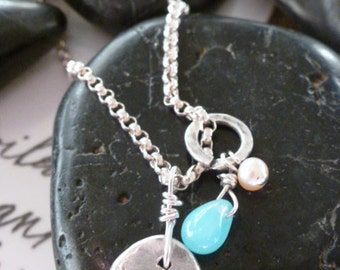 simple.sterling.disc.aqua.drop