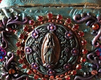 altered altoid tin with Guadalupe