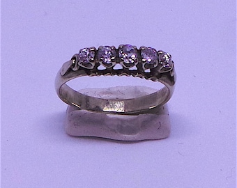 5 stone engagement/eternity ring in 18 carat gold
