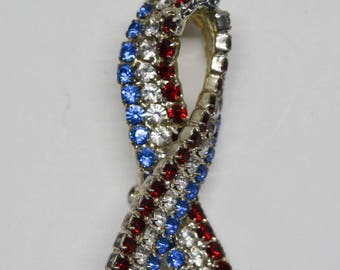 Red , white and blue patriotic pin