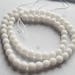 6mm Faceted Round white Jade Full strand