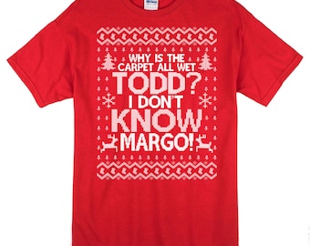 Why is the Carpet All Wet Todd I Don't Know Margo T Shirt - Christmas Party Shirt - Gildan Unisex Cotton T Shirt - Item 1222