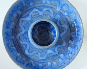 Cascading blues on a stoneware plate with central dip section